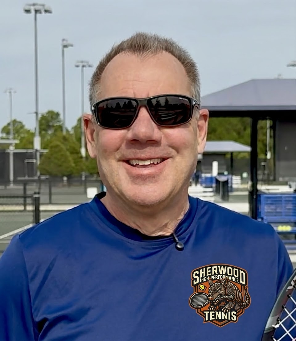 Coach John Sherwood on court